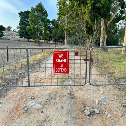 Reflective Sign - We Stayed to Defend