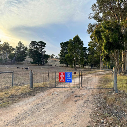 Reflective Sign - We Stayed to Defend